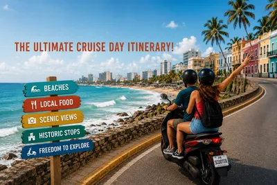 Couple riding a scooter from Puerto Rico Scooter & Can Am Rentals along Puerto Rico's scenic metro coastline with beaches, colorful buildings and a sign highlighting local attractions during a San Juan cruise stop.
