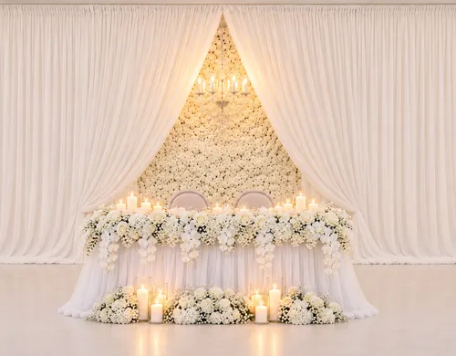Flower Wall & Draped Sweetheart Table Decor
