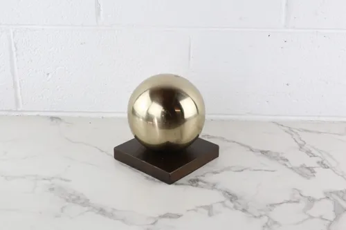 Brass Sphere on Walnut