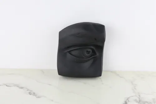 Vintage Black Eye Relief Carving