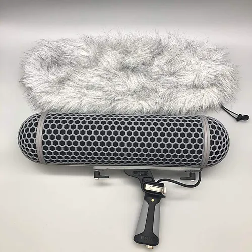Sennheiser 416 (shotgun) microphone with RODE blimp system
