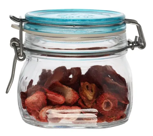 Clear Glass Canister With Blue Clamp Lid Containing Freeze Dried Strawberries
