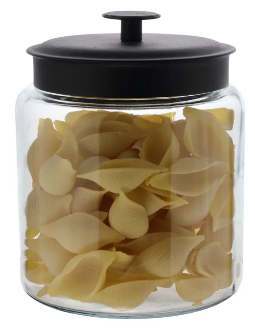 Clear Glass Canister With Black Lid Containing Pasta