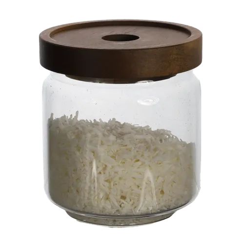 Clear Glass Canister With Walnut Lid Containing Shredded Coconut