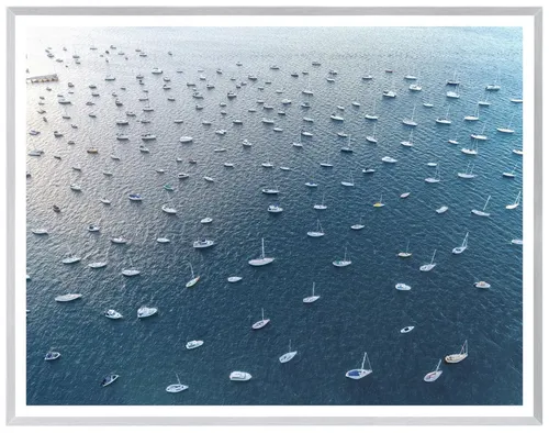 Ariel View Of Boats On Ocean With White Frame