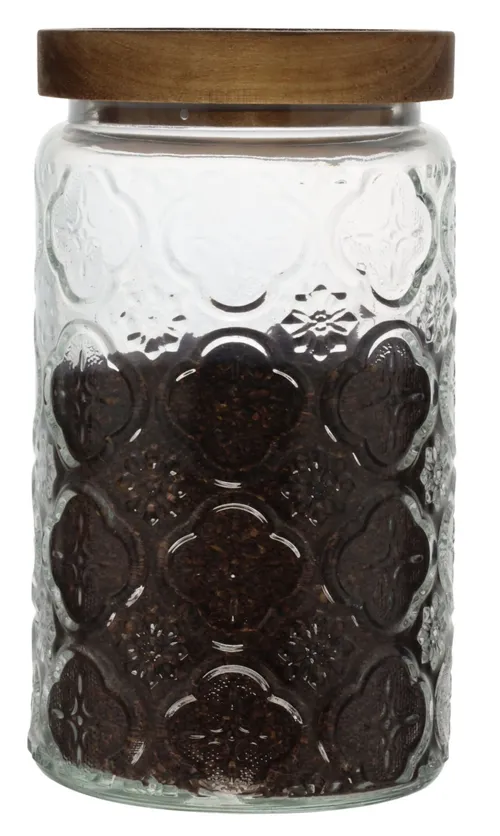 Clear Patterned Glass Canister With Wood Lid Containing Ground Coffee