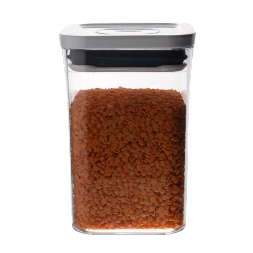 Clear Square Pop Top Low Profile Storage Container With White Lid Containing Orange Lentils