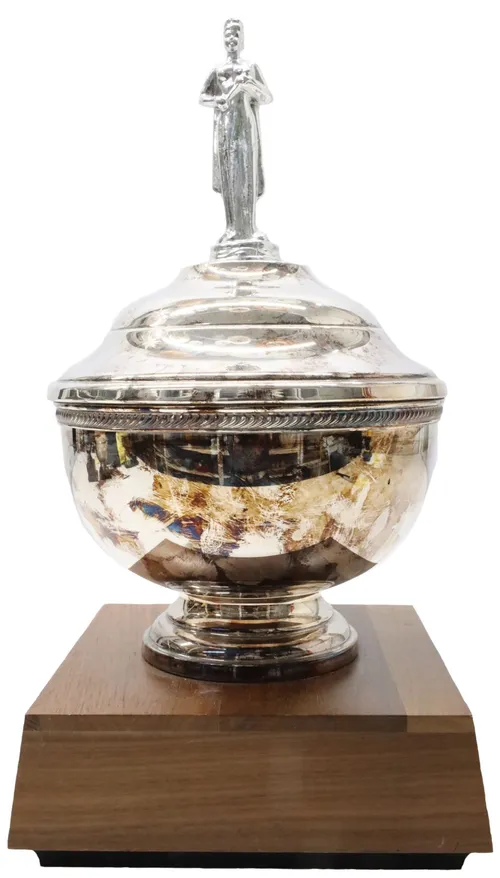 Silver Trophy With Figure On Wood Base