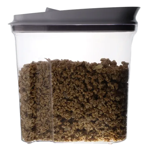 Clear Plastic Container With White Lid Containing Granola Cereal
