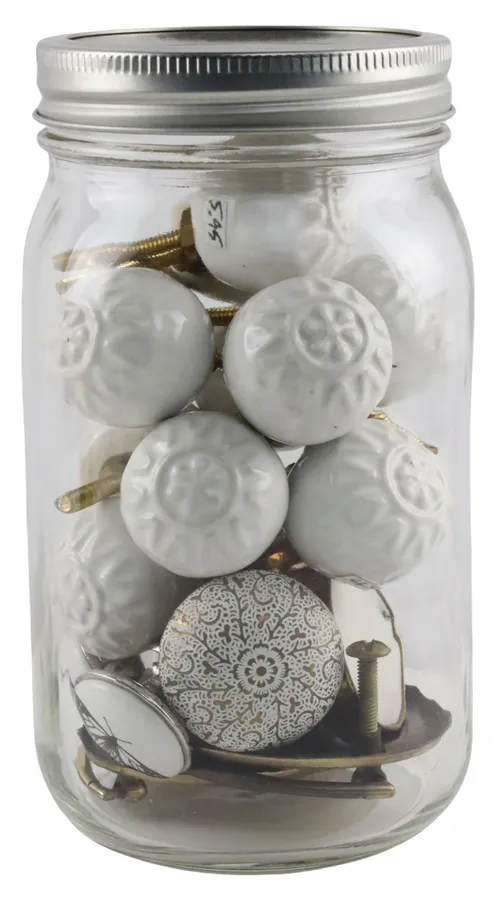 Clear Glass Jar With White Patterned Drawer Knobs