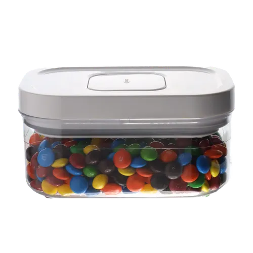 Clear Rectangular Low Profile Pop Top Storage Container With White Lid Containing Candy
