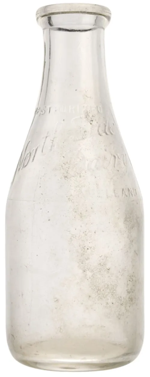 Antique Clear Glass Aged Milk Bottle