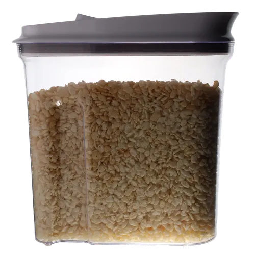 Clear Plastic Container With White Lid Containing Rice Puff Cereal