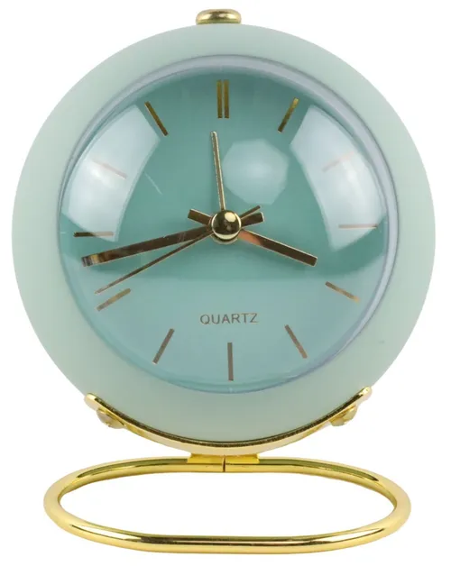 Soft Green Orb Alarm Clock On Gold Base