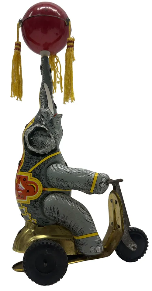 Tin Windup Elephant Riding Scooter