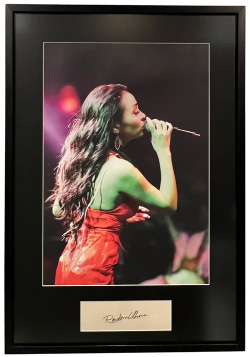Photograph Of Singer Musician With Microphone With Autographed Plate In Black Frame