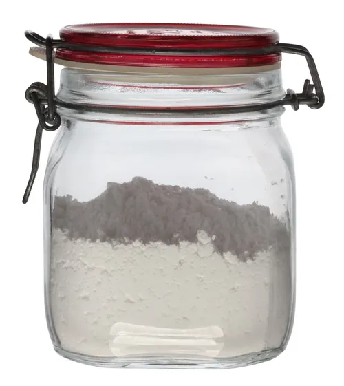 Clear Glass Canister With Red Clamp Lid Containing Flour