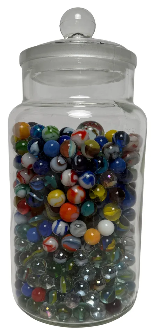 Clear Glass Bottle Containing Marbles
