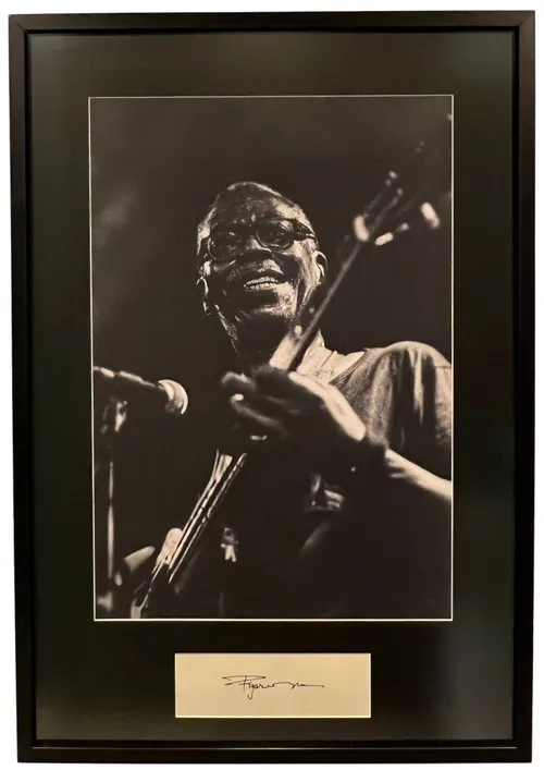 Black & White Photograph Of Guitarist Musician With Autographed Plate In Black Frame