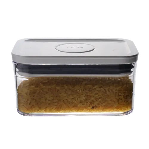 Clear Rectangular Pop Top Low Profile Storage Container With White Lid Containing Yellow Rice