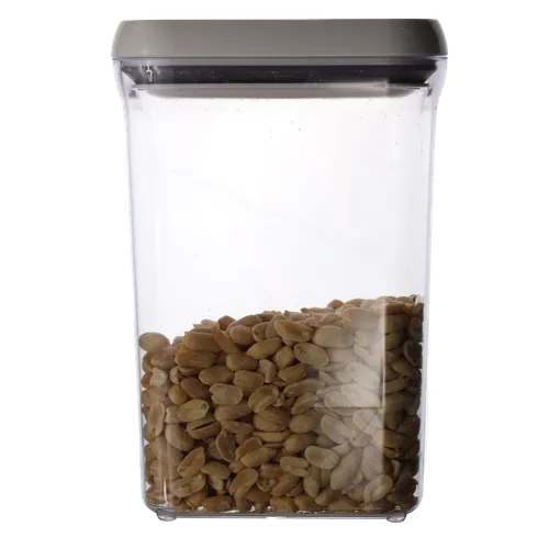 Clear Rectangular Pop Top Storage Container With White Lid Containing Peanuts