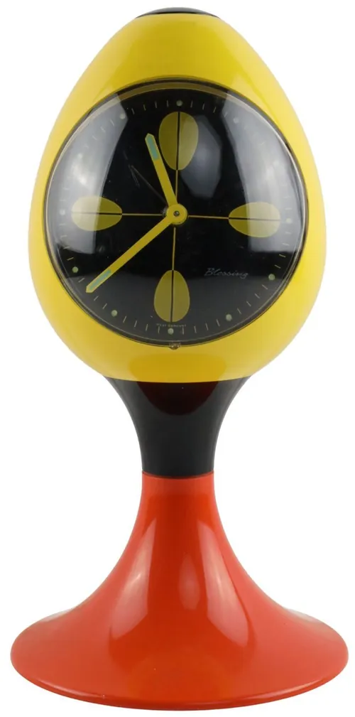 Vintage Yellow Egg Alarm Clock On Orange Base
