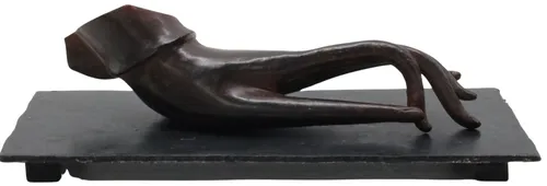 Reclining Hand On Black Metal Base