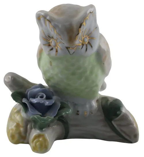 Porcelain Owl On Branch