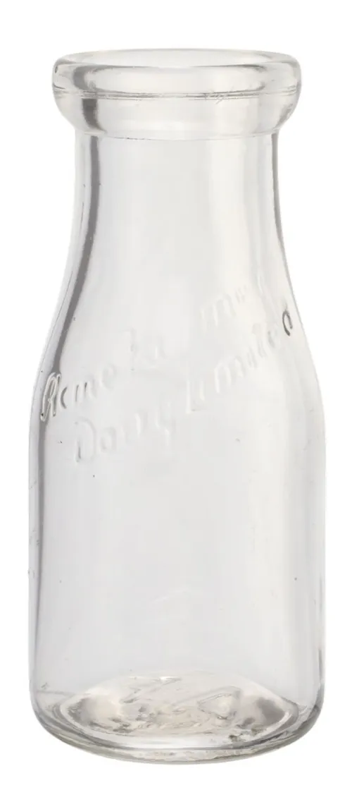 Antique Clear Glass Seven Ounce Milk Bottle