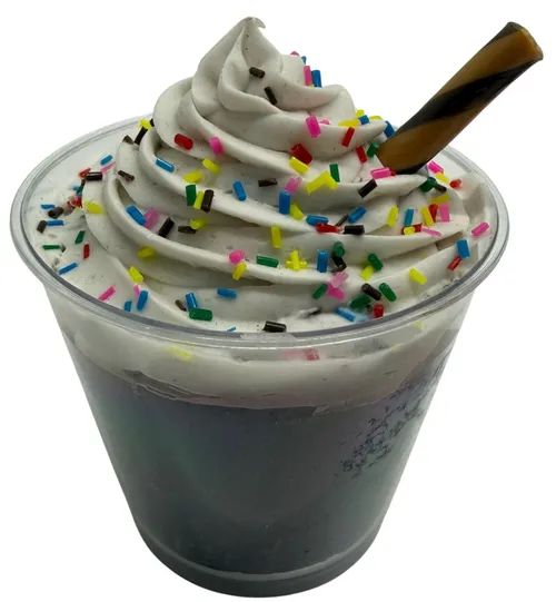 Artificial Chocolate Cake With Vanilla Frosting In A Cup