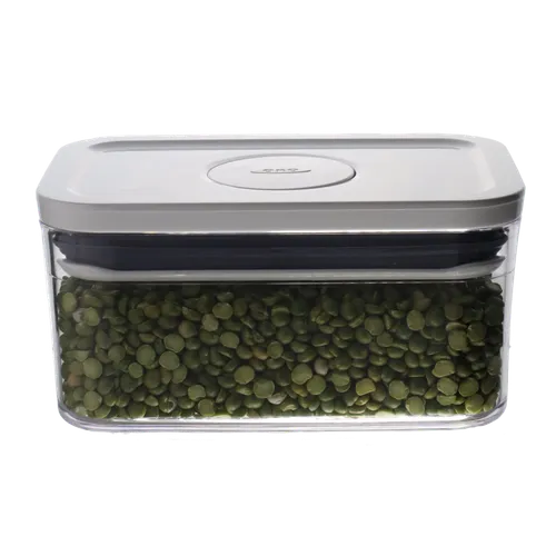 Clear Rectangular Pop Top Low Profile Storage Container With White Lid Containing Green Lentils