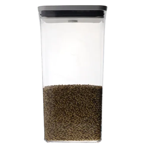 Clear Rectangular Pop Top Low Profile Storage Container With White Lid Containing Barley