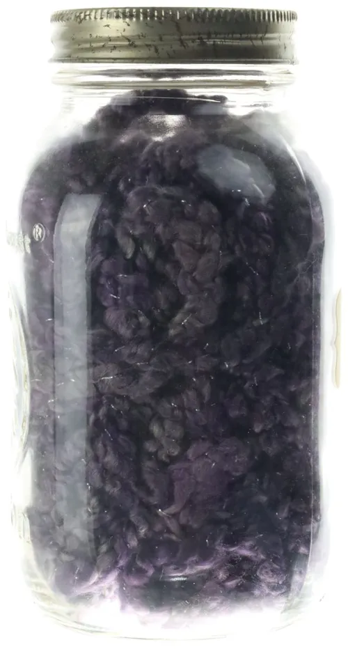 Glass Jar With Purple Wool Yarn