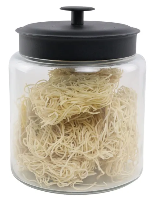 Clear Glass Canister With Black Lid Containing String Pasta