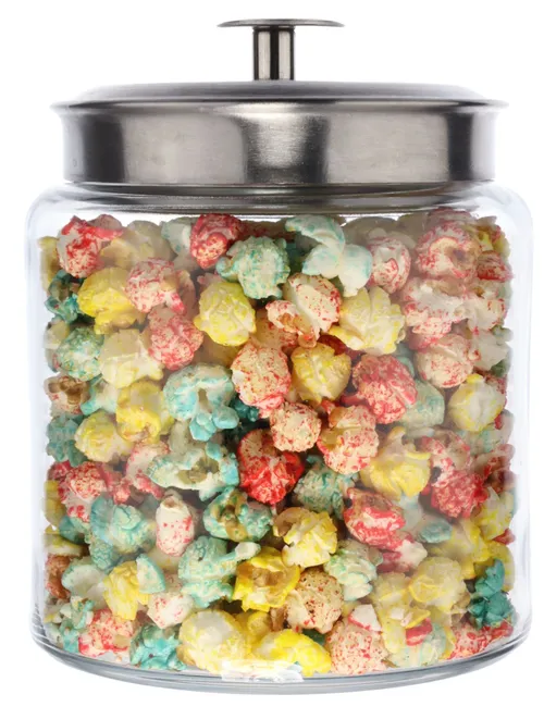 Clear Glass Canister With Silver Lid Containing Popcorn