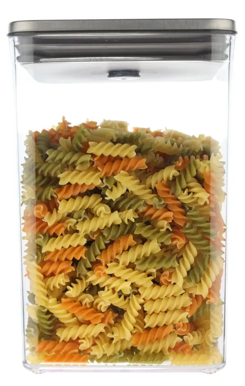 Clear Tall Rectangular Pop Top Low Profile Storage Container With Brushed Metal Lid Containing Pasta