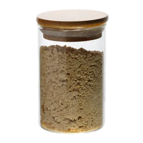 Clear Glass Canister With Bamboo Lid Containing Graham Crumbs