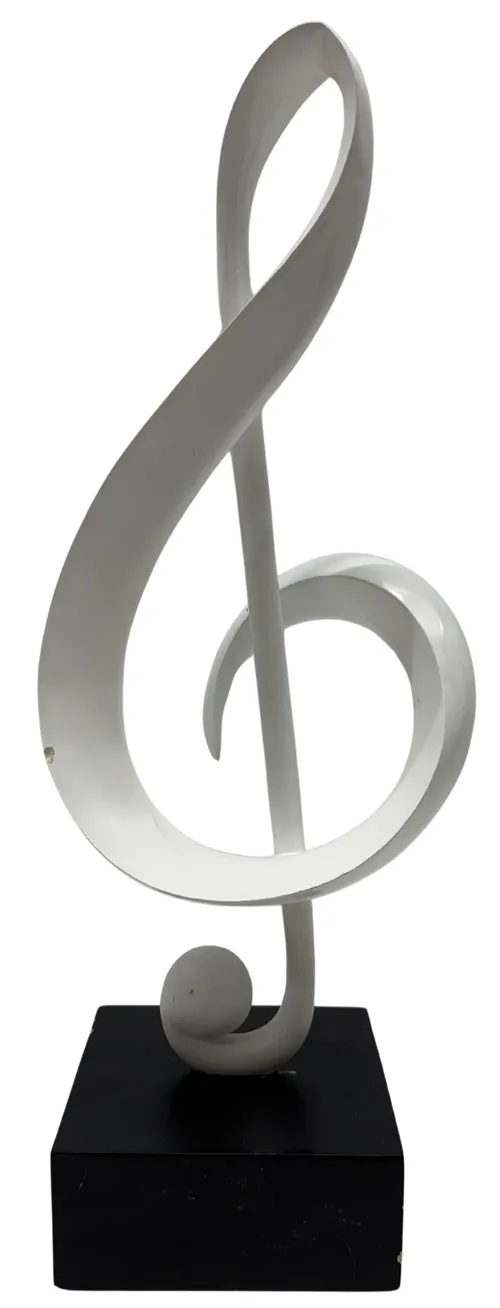 White Music Note Sculpture On Black Base