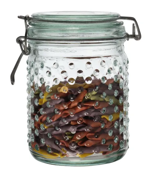 Clear Dotted Glass Canister With Clamp Lid Containing Pasta