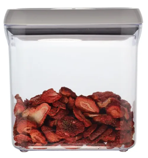 Clear Plastic Rectangular Canister With Lid Containing Dehydrated Strawberries