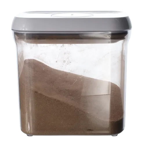Clear Rectangular Pop Top Storage Container With White Lid Containing Hot Chocolate Powder