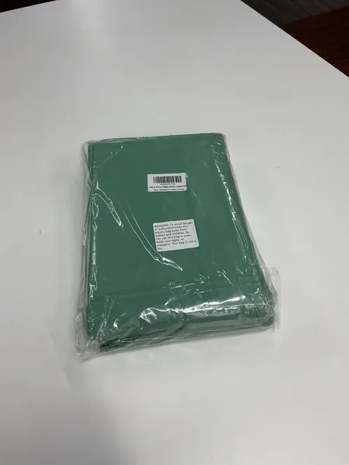 Sage green circular plastic table cloths 