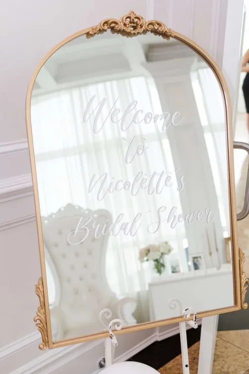 Gold ornate mirror - Welcome sign