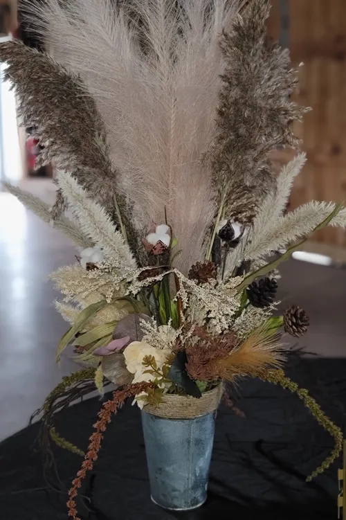 Galvanized bucket with arrangement 