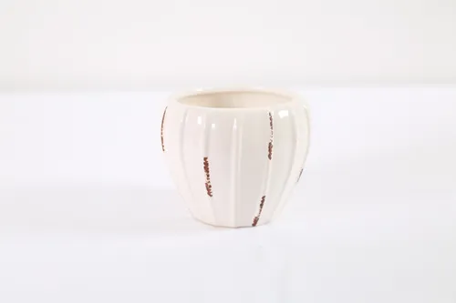 Beige pottery vase with red details