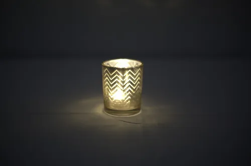 Golden candle jar with lights