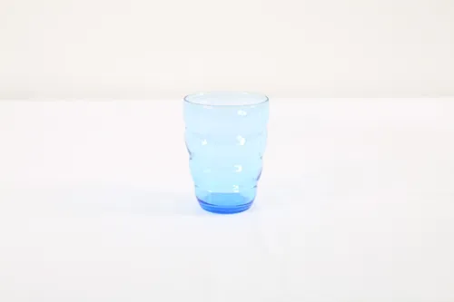 Transparent blue water glass