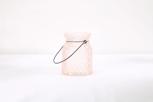 Pink glass candle jar with lights