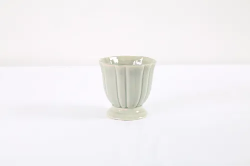 Green pottery vase