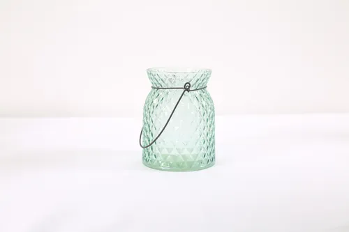 Blue glass candle jar with lights